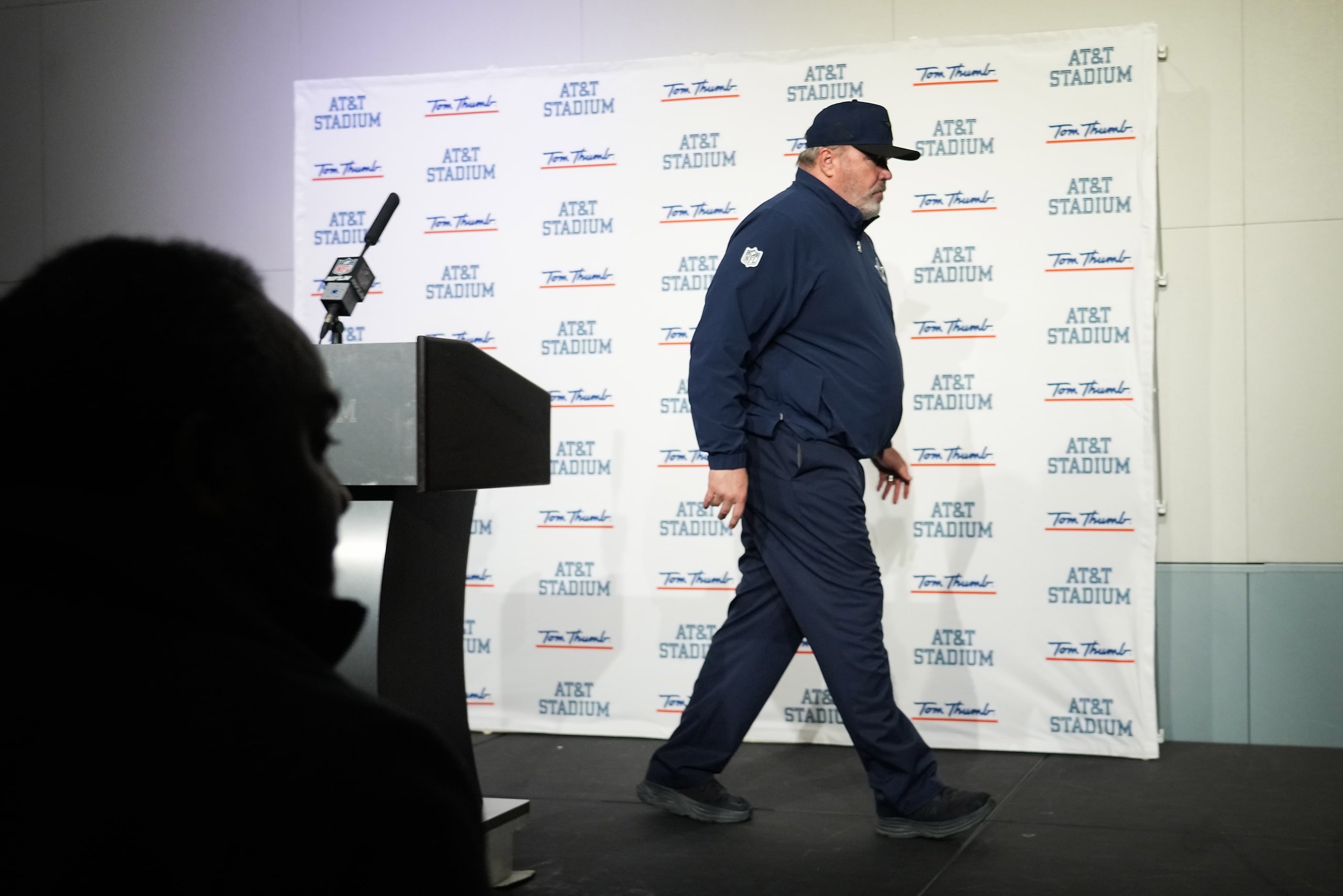 Dallas Cowboys head coach Mike McCarthy leaves the podium following a press conference after...