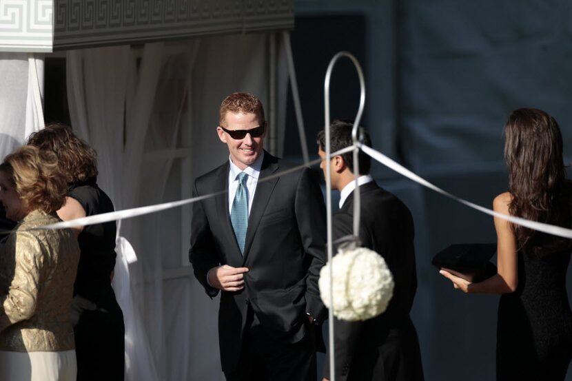 Cowboys head coach Jason Garrett arrives at the wedding of Tony Romo and Candice Crawford at...