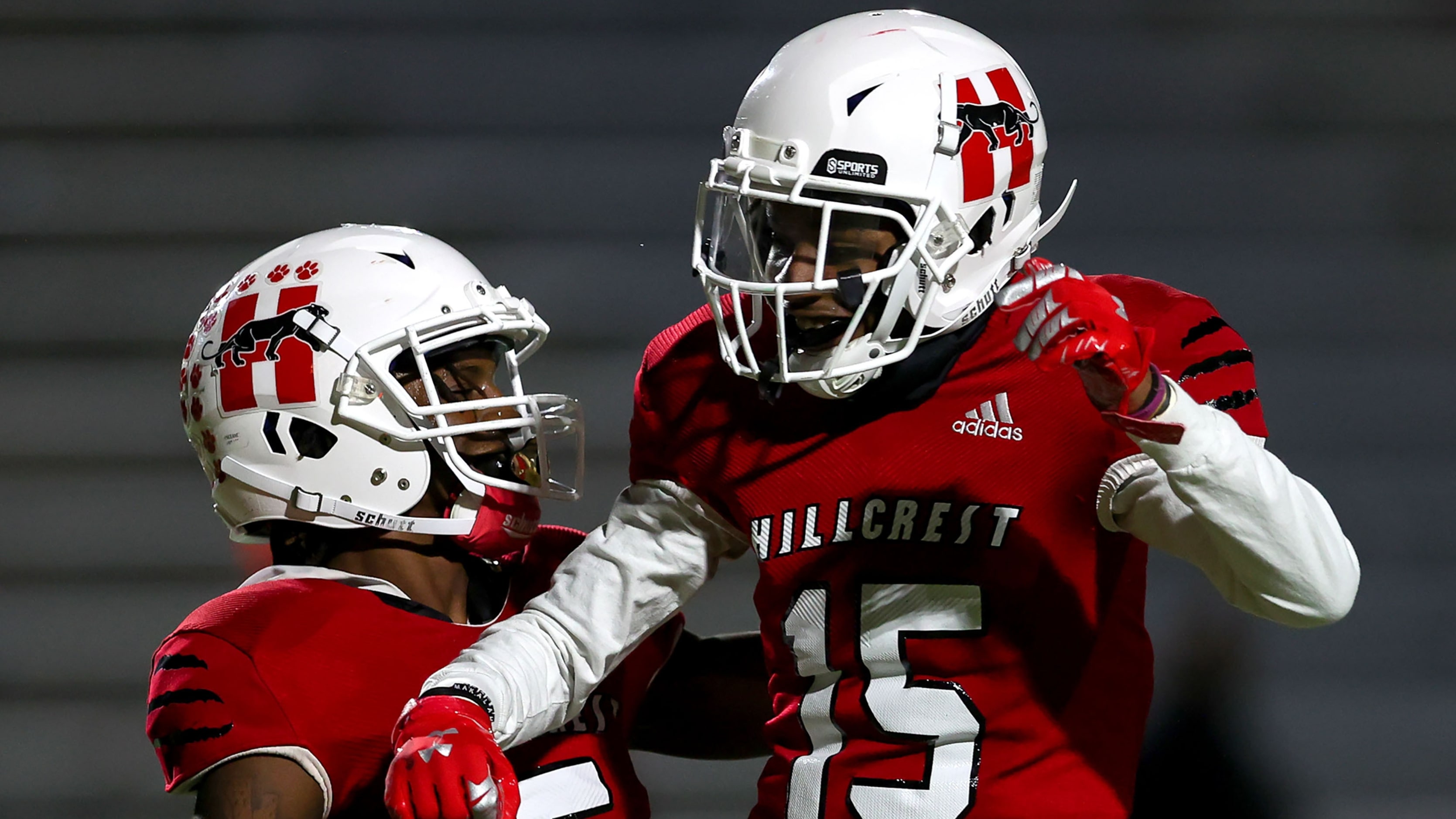 Hillcrest wide receiver Shannon Cruse (5) and wide receiver Donald Olusegun (15) celebrate...