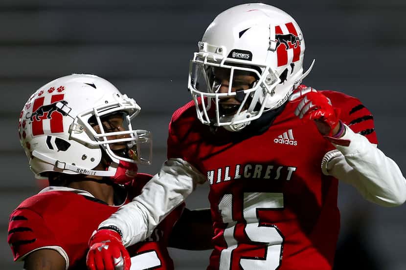 Hillcrest wide receiver Shannon Cruse (5) and wide receiver Donald Olusegun (15) celebrate...