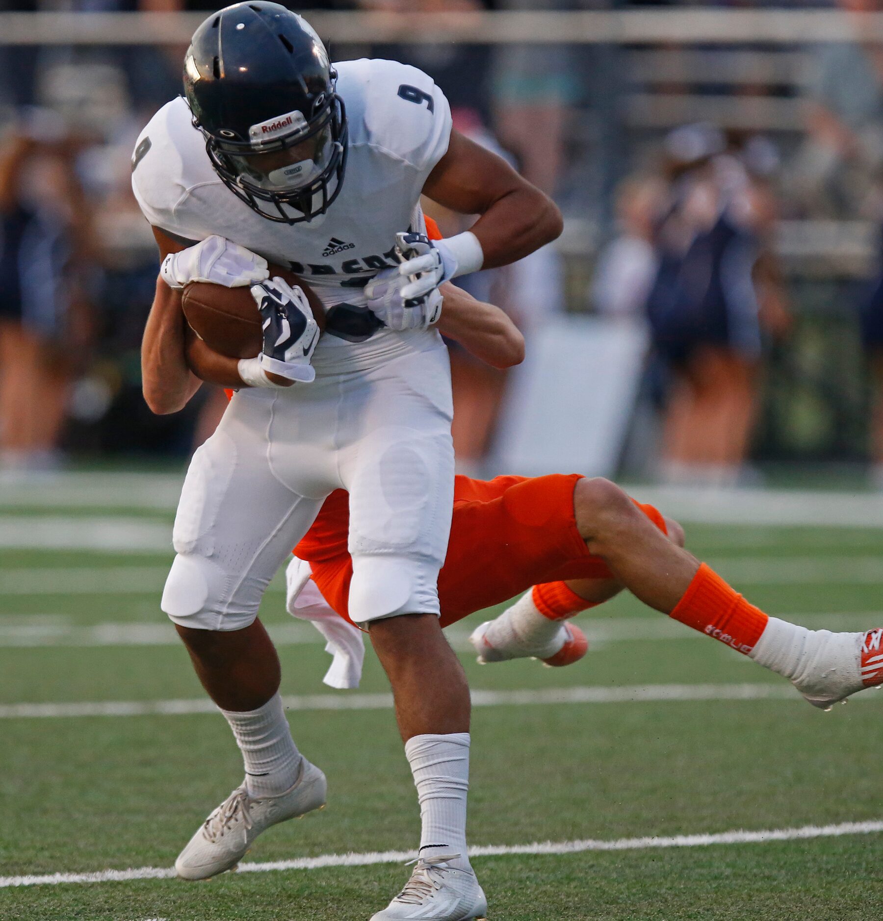 Celina High School defensive back Jeff Sims (13) got a hand on the football caught by...