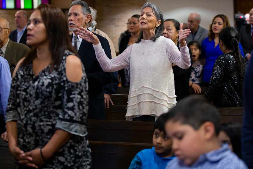 Lydia Sanchez amid First Mexican Baptist Church's congregation celebrating its first service...