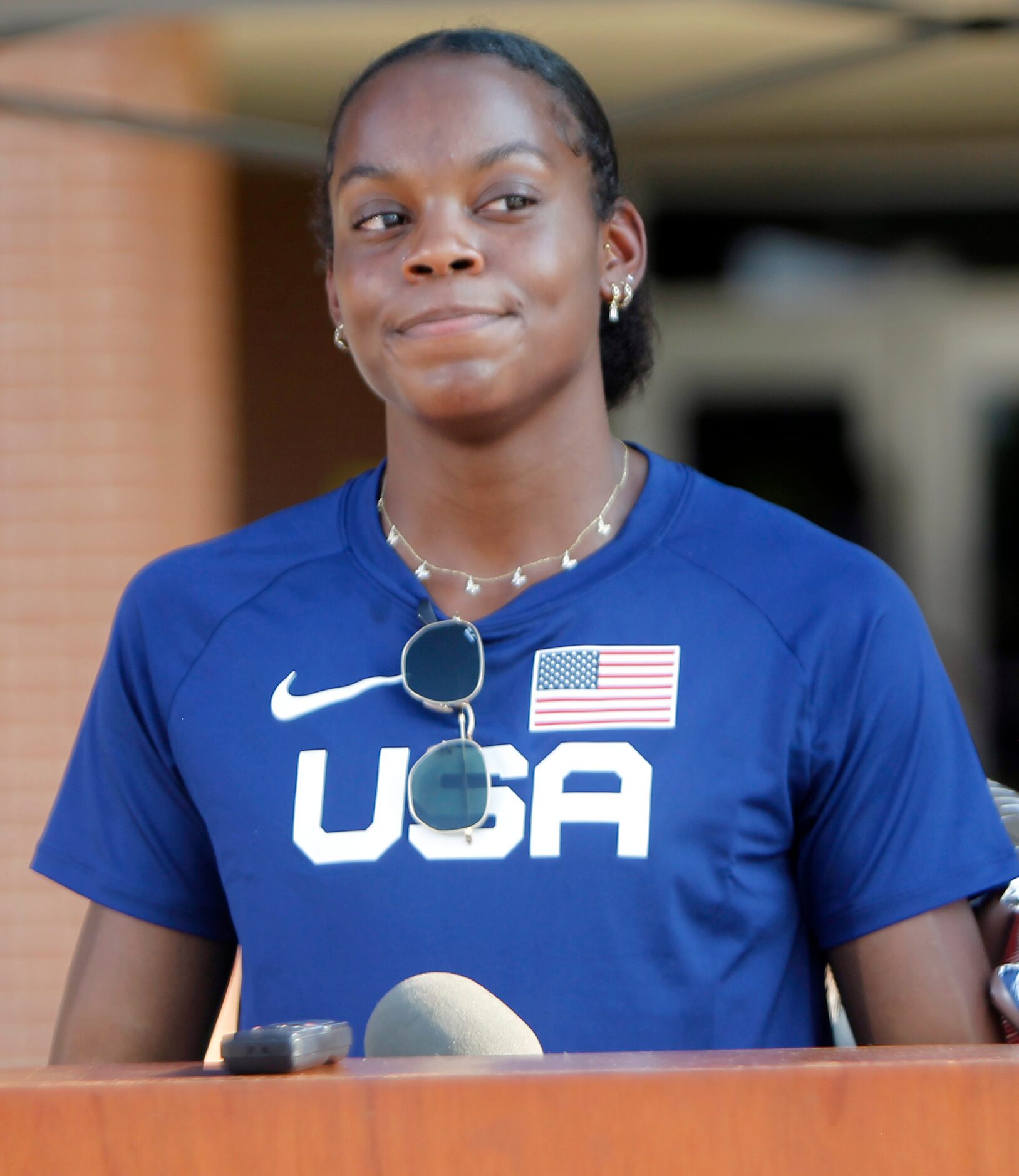 Jasmine Moore listens to a reporter's question during a press conference at the conclusion...