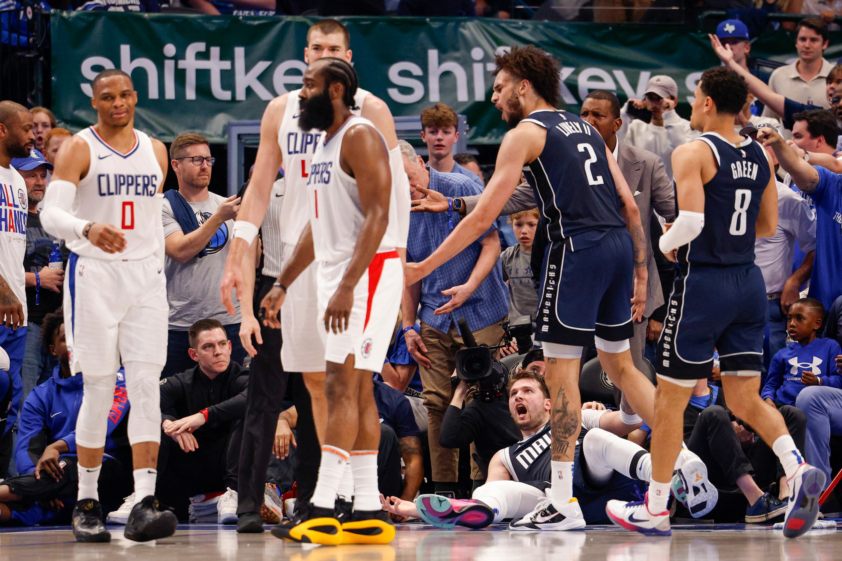 Dallas Mavericks guard Luka Doncic (77) reacts after being fouled by LA Clippers guard...