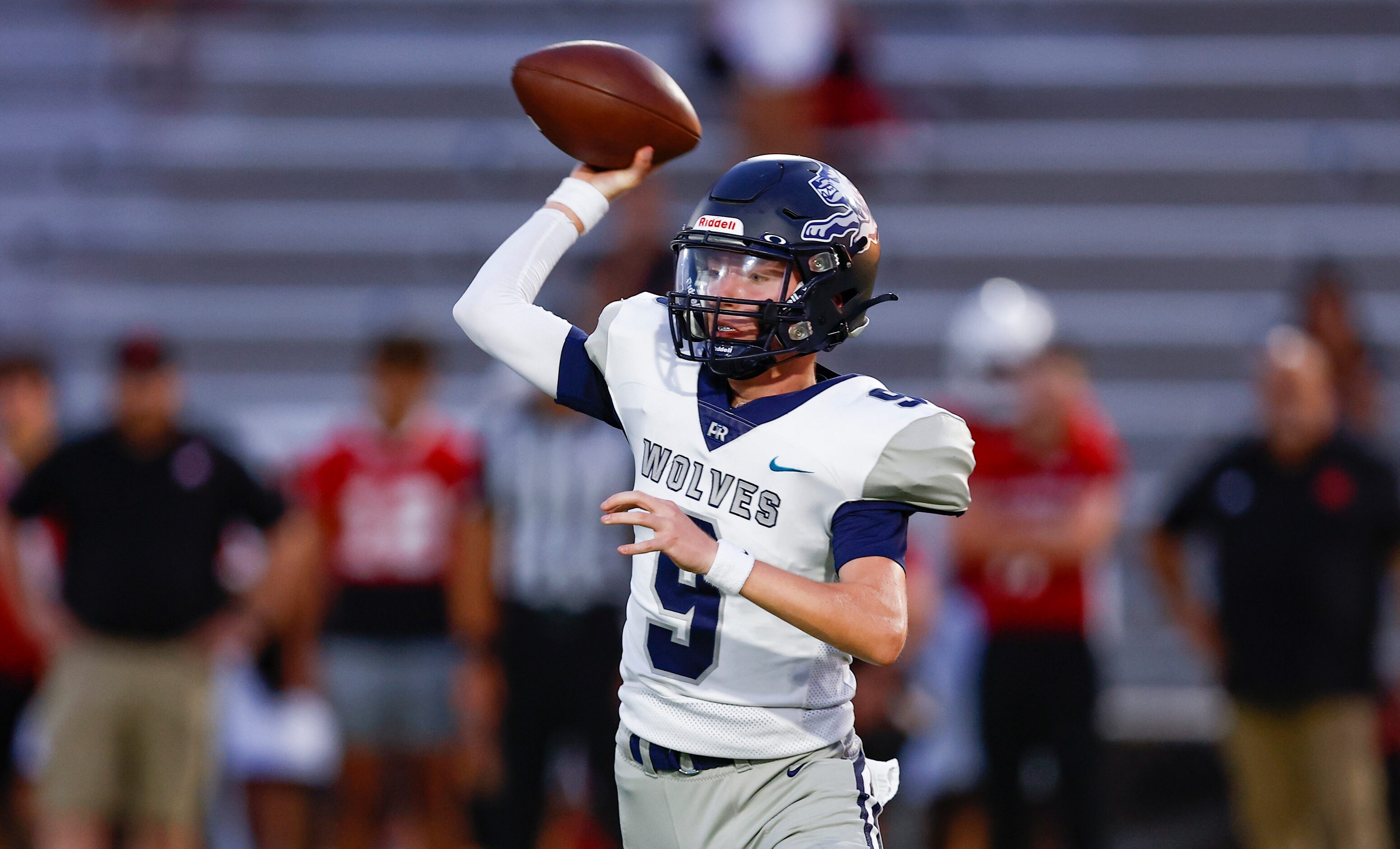 Carrollton Ranchview junior quarterback Andrew Erlenbusch (9) throws during the first half...