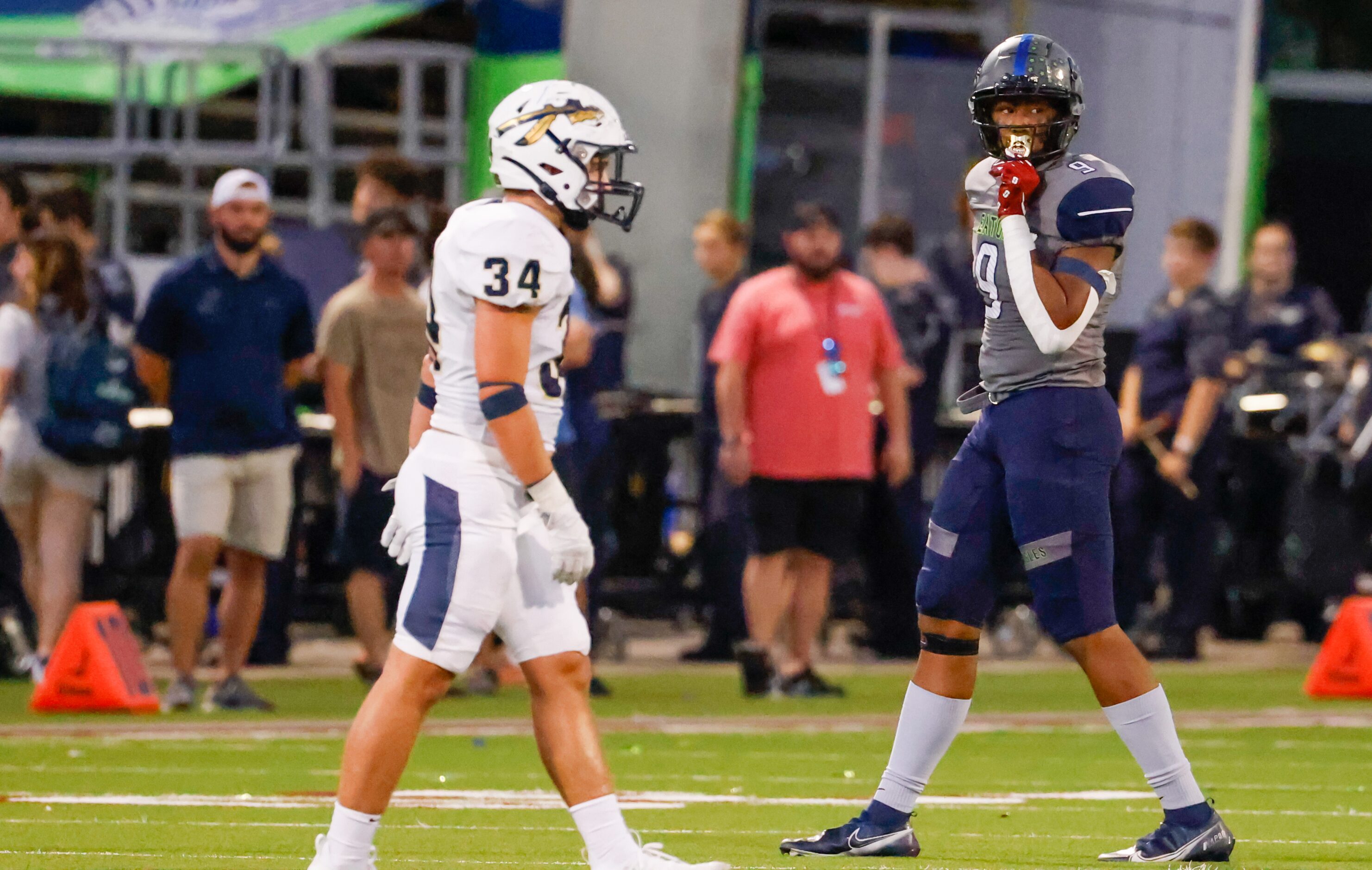 V.R. Eaton High School tight end Jaden Platt (9) moves back into position during the first...