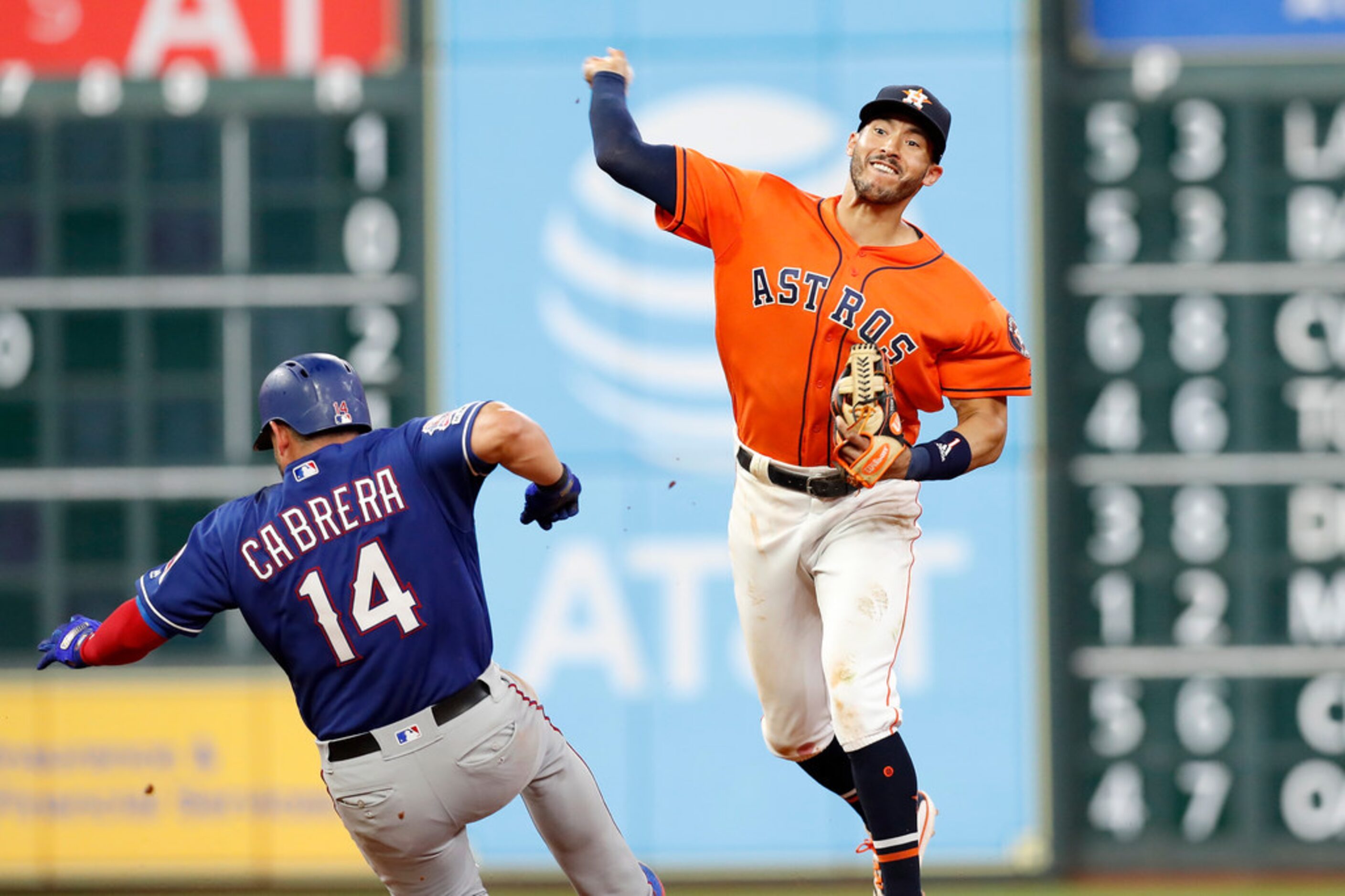 HOUSTON, TX - MAY 10:  Carlos Correa #1 of the Houston Astros forces Asdrubal Cabrera #14 of...