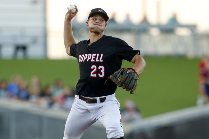 Coppell starting pitcher Ray Gaither wheels around and throws to first on a pick off attempt...