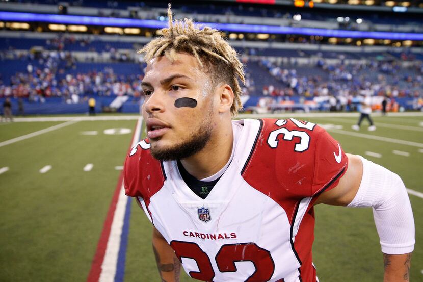 INDIANAPOLIS, IN - SEPTEMBER 17: Tyrann Mathieu #32 of the Arizona Cardinals runs off the...