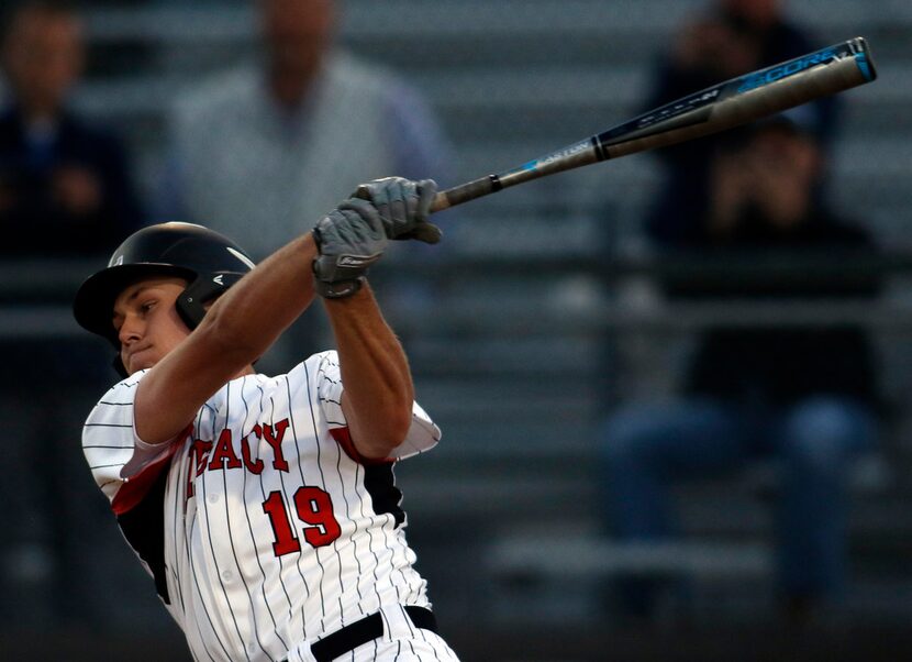 Mansfield Legacy pitcher Nate Rombach (19) fouls off a pitch as he bats during the second...