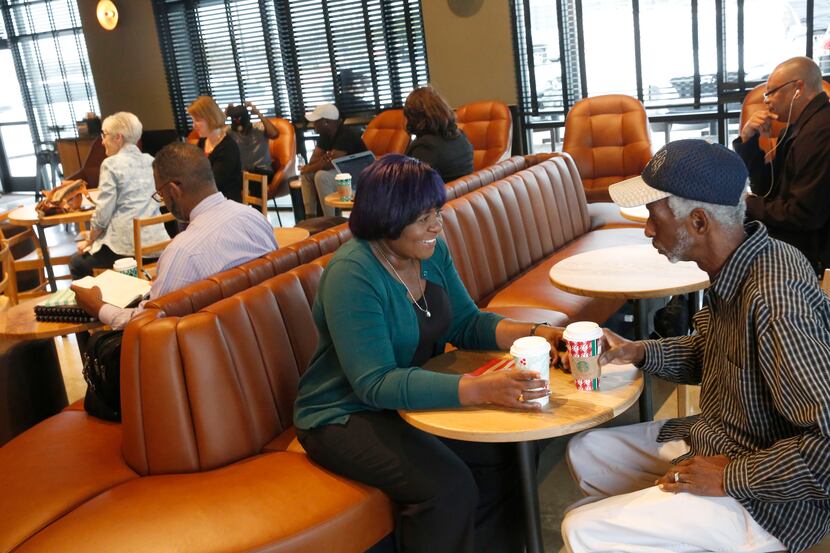 C.C. Ward and her husband, Harry Ward, of Duncanville, Texas, drink coffee at the newly...