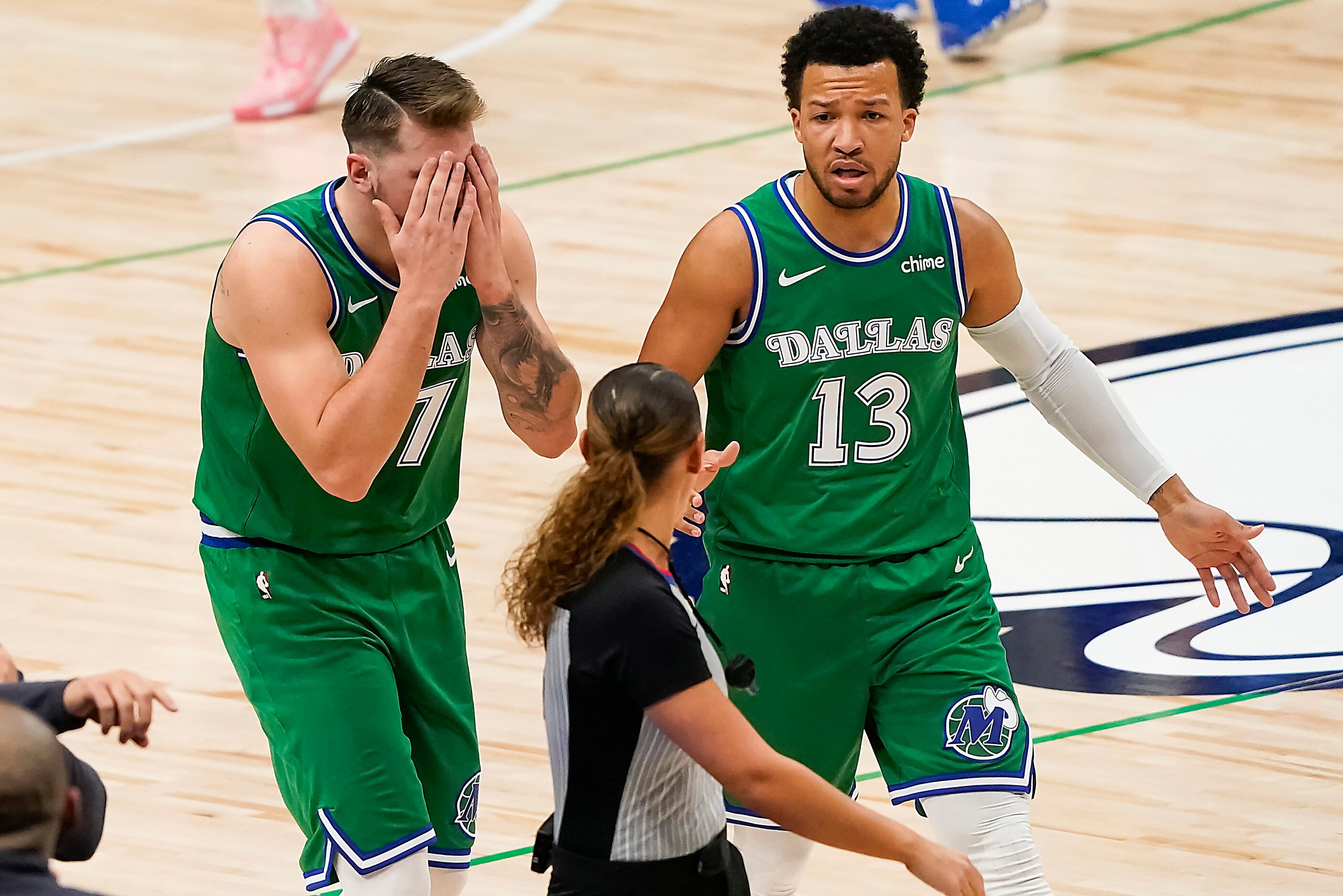 Dallas Mavericks guard Luka Doncic (77) reacts after being called for a foul with guard...