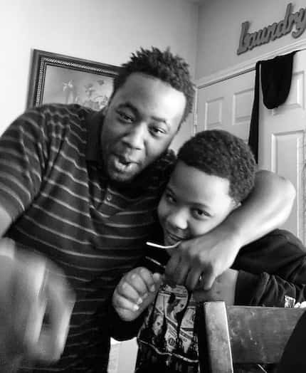 Dontrell with his younger brother Zayden goofing around in their Frisco apartment in...