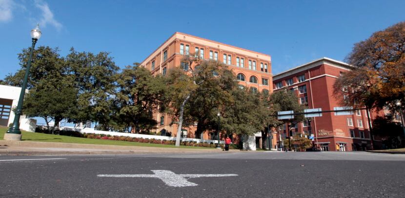 The new white "X" has been replaced at Dealey Plaza after the 50th-anniversary commemoration...