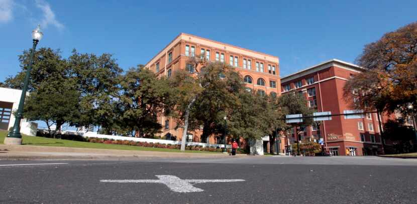 The new white "X" has been replaced at Dealey Plaza after the 50th-anniversary commemoration...