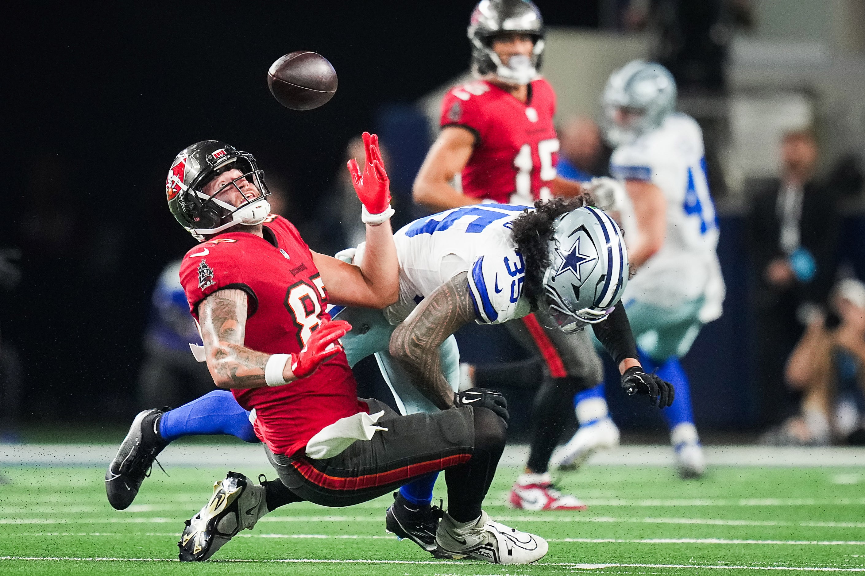 Dallas Cowboys linebacker Marist Liufau (35) knocks a pass away from Tampa Bay Buccaneers...