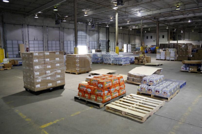 The USO warehouse near D/FW Airport, once packed with chips and cookies, shaving cream and...