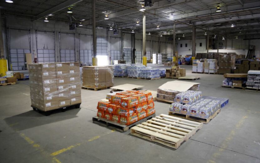 The USO warehouse near D/FW Airport, once packed with chips and cookies, shaving cream and...
