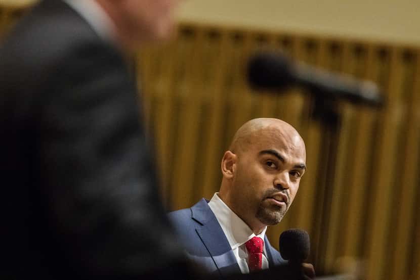 Democratic challenger Colin Allred looks at Rep. Pete Sessions (R-Dist. 32) while speaking...