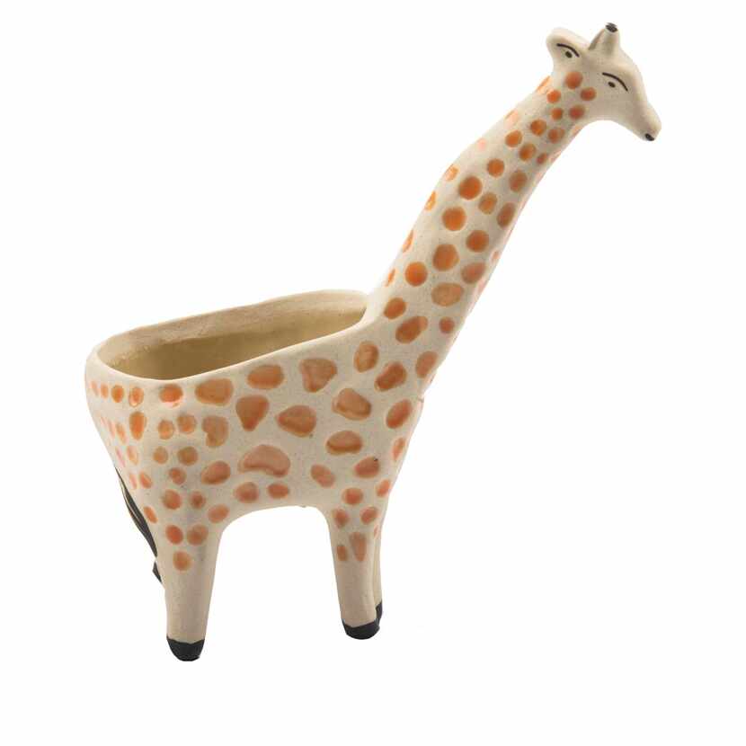 Giraffes and other exotic animal planters are sized for the tabletop. $20 each at...