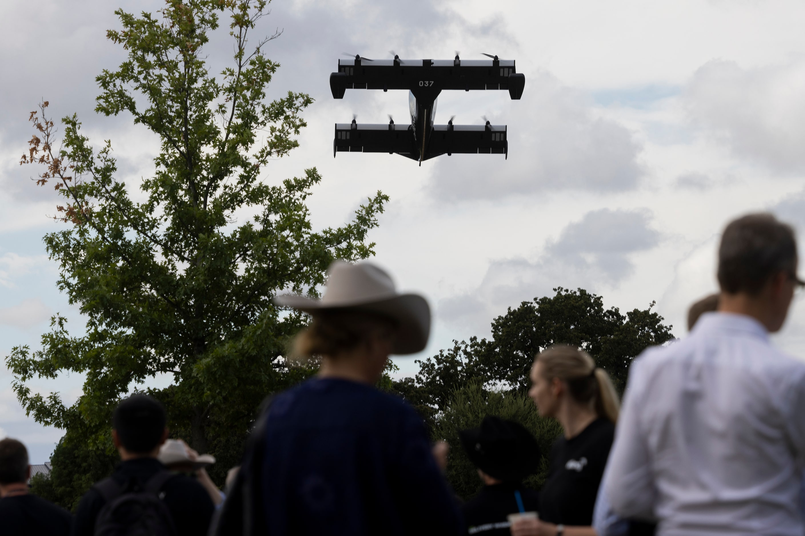 Attendees watch as Pivotal demonstrates its BlackFly eVTOL during the UP.Summit 2023 at the...