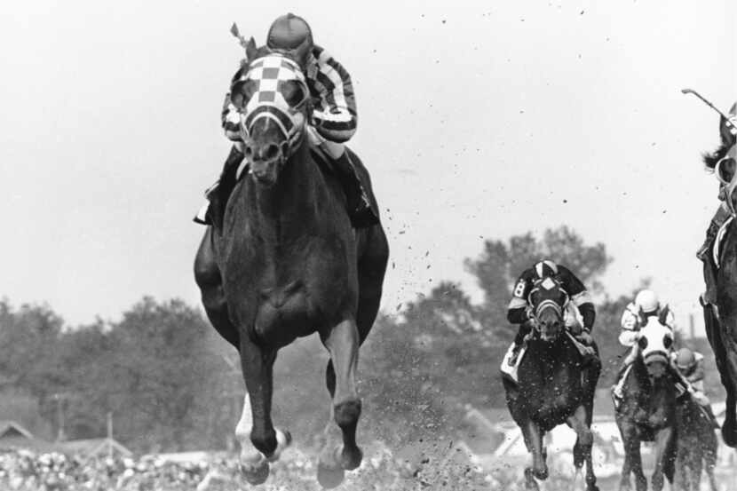 FILE - Jockey Ron Turcotte rides Secretariat during the 99th Kentucky Derby at Churchill...