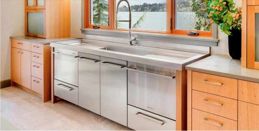  Stainless steel counters are more common in modern kitchens. (National Kitchen & Bath...