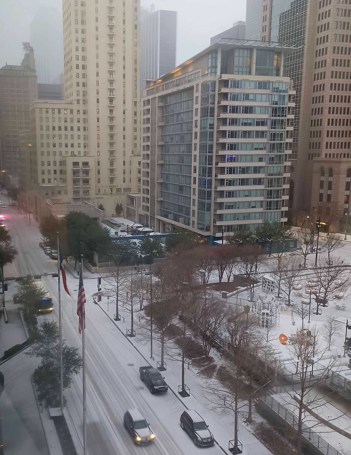 Ice accumulates along Commerce Street in downtown Dallas on Tuesday, Jan. 31, 2023. 