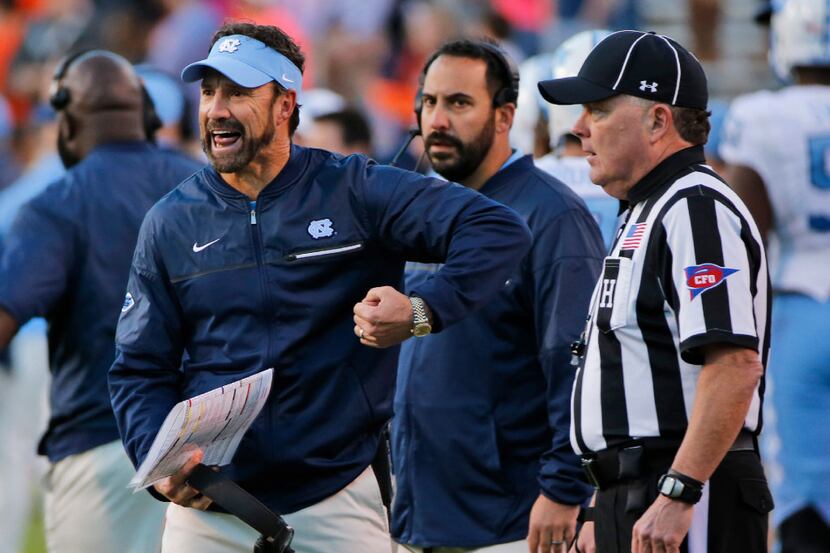 FILE — North Carolina head coach Larry Fedora reacts to a call during the second half of an...