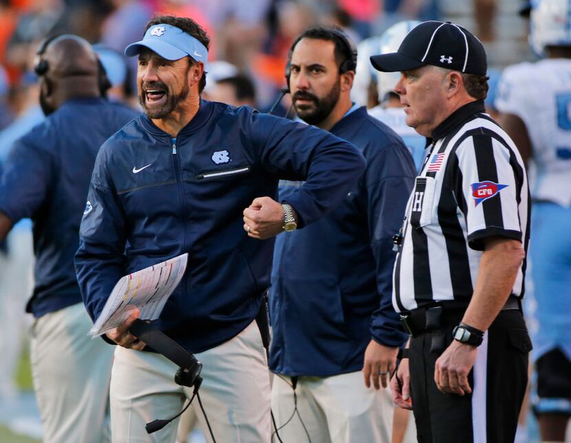 North Carolina head coach Larry Fedora reacts to a call during the second half of an NCAA...