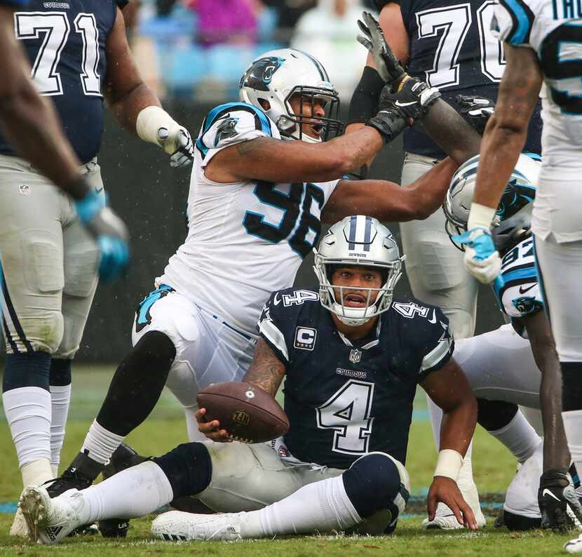 Carolina Panthers defensive end Wes Horton (96) celebrates after bringing down Dallas...