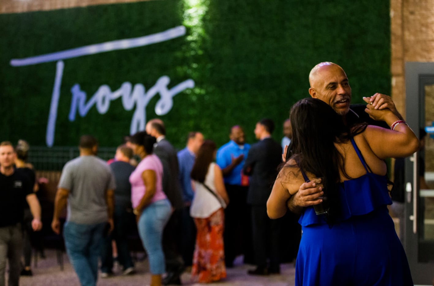 Juanita Reyna and Jesse Franco dance at Troy's during the grand opening celebration for...