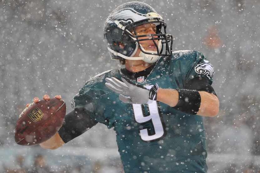 Dec 8, 2013; Philadelphia, PA, USA; Philadelphia Eagles quarterback Nick Foles (9) warming...