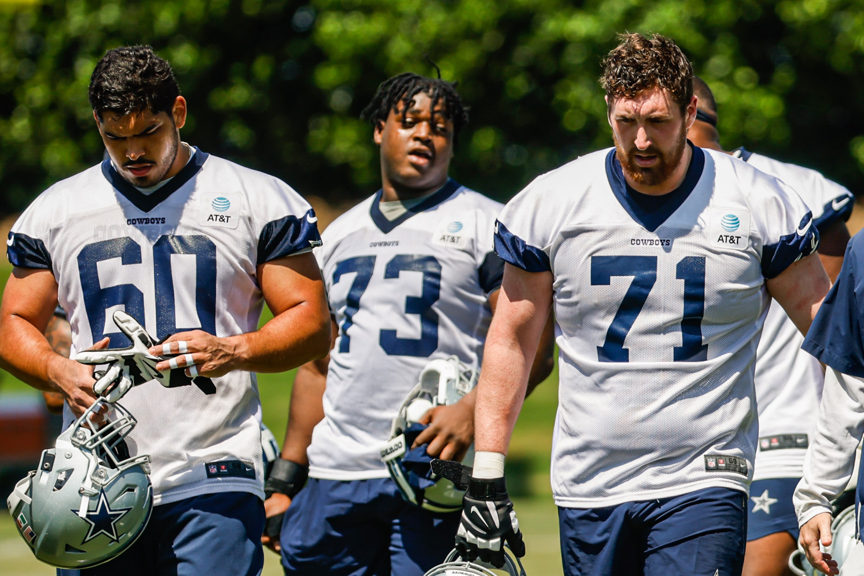 Dallas Cowboys guard (60) Isaac Alarcon, offensive tackle (73) Tyler Smith and offensive...