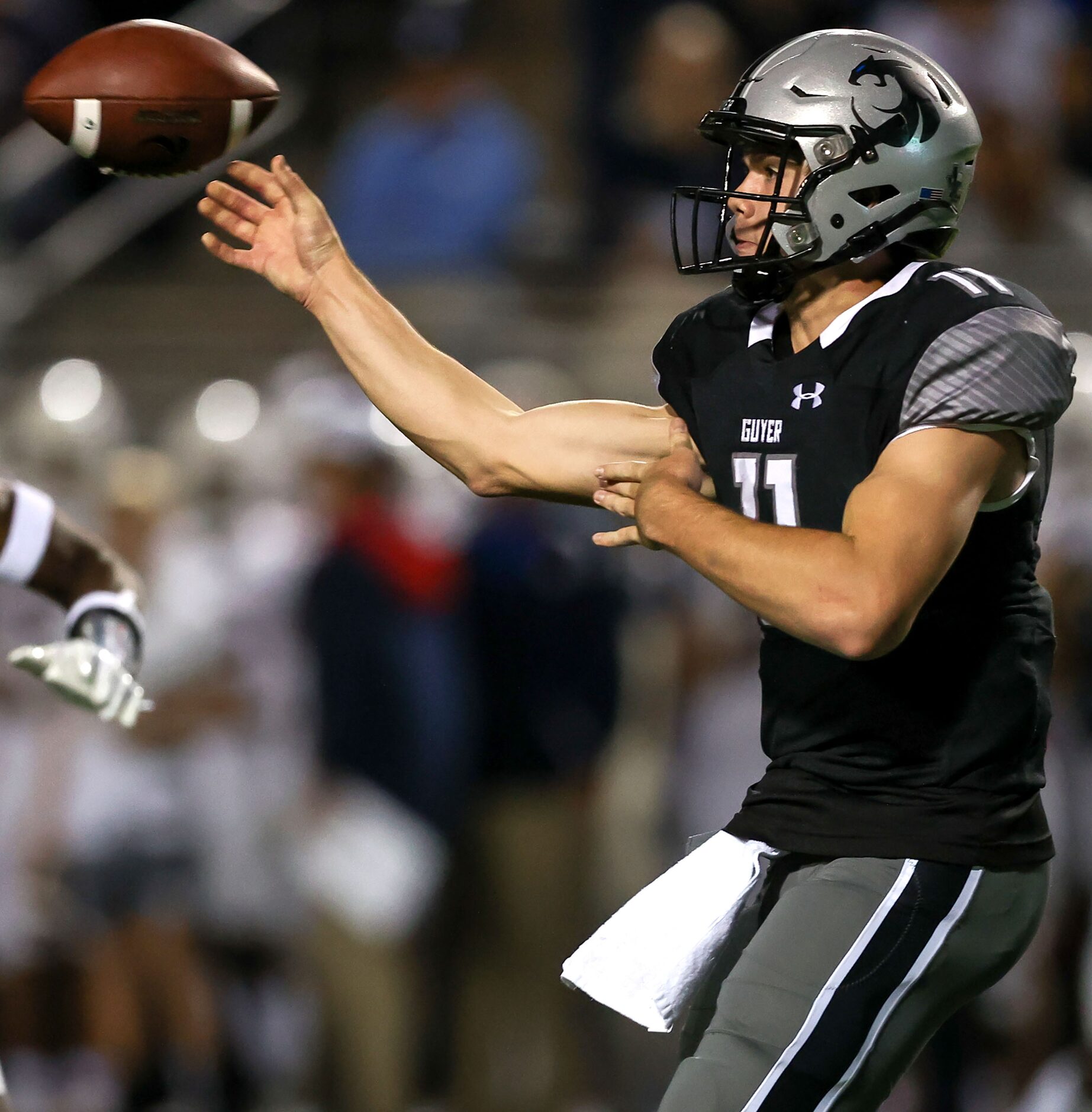 Denton Guyer quarterback Jackson Arnold dumps off a short pass against Allen during the...