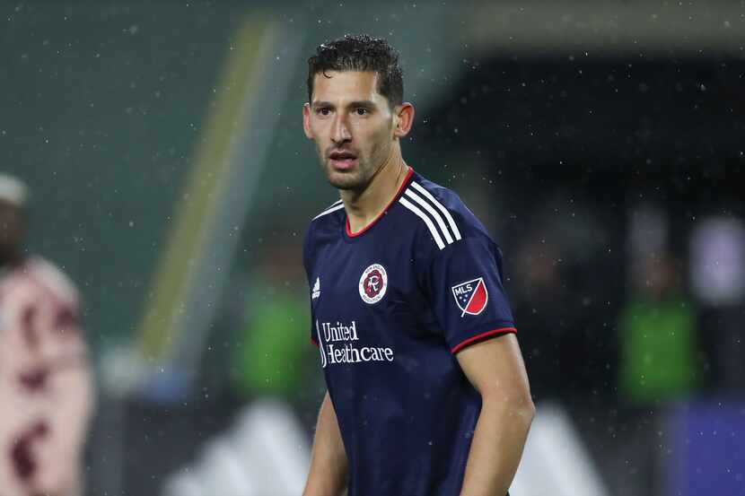 New England Revolution defender Omar Gonzalez plays during the second half of an MLS soccer...