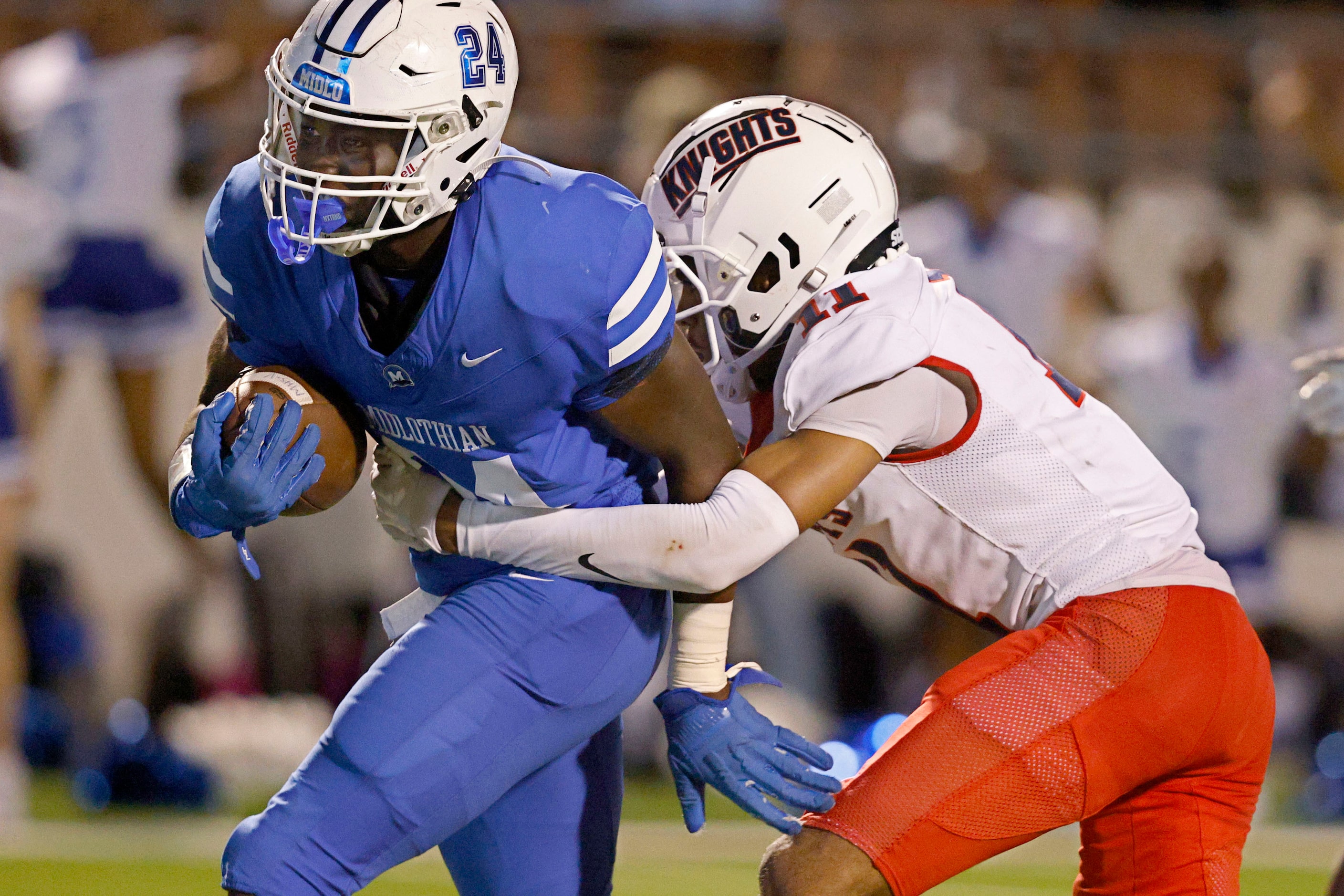 Midlothian's Michael Archie (24) runs into the end zone for a touchdown as Kimball's...