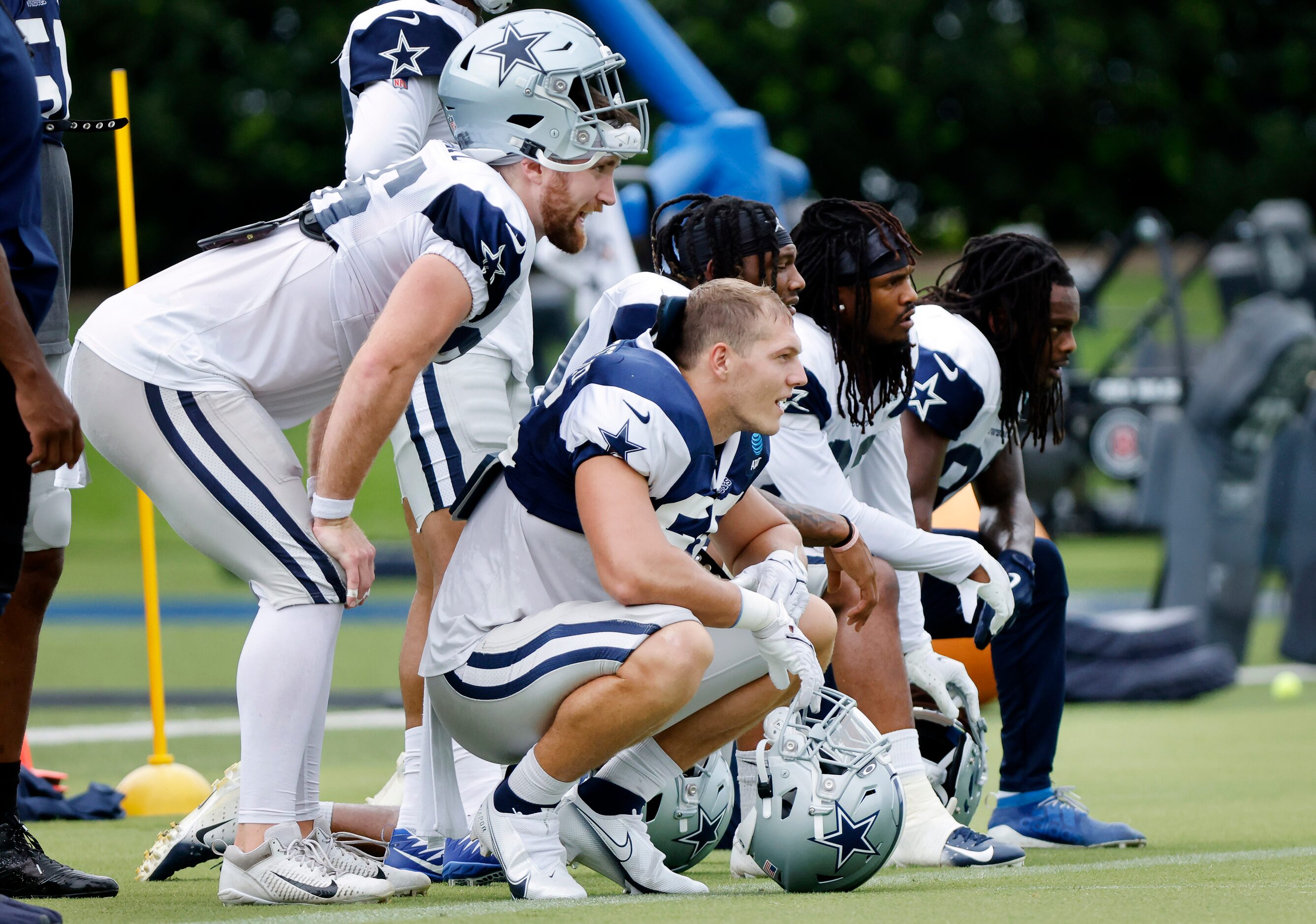 Dallas Cowboys tight end Dalton Schultz (left) and linebacker Leighton Vander Esch (second...