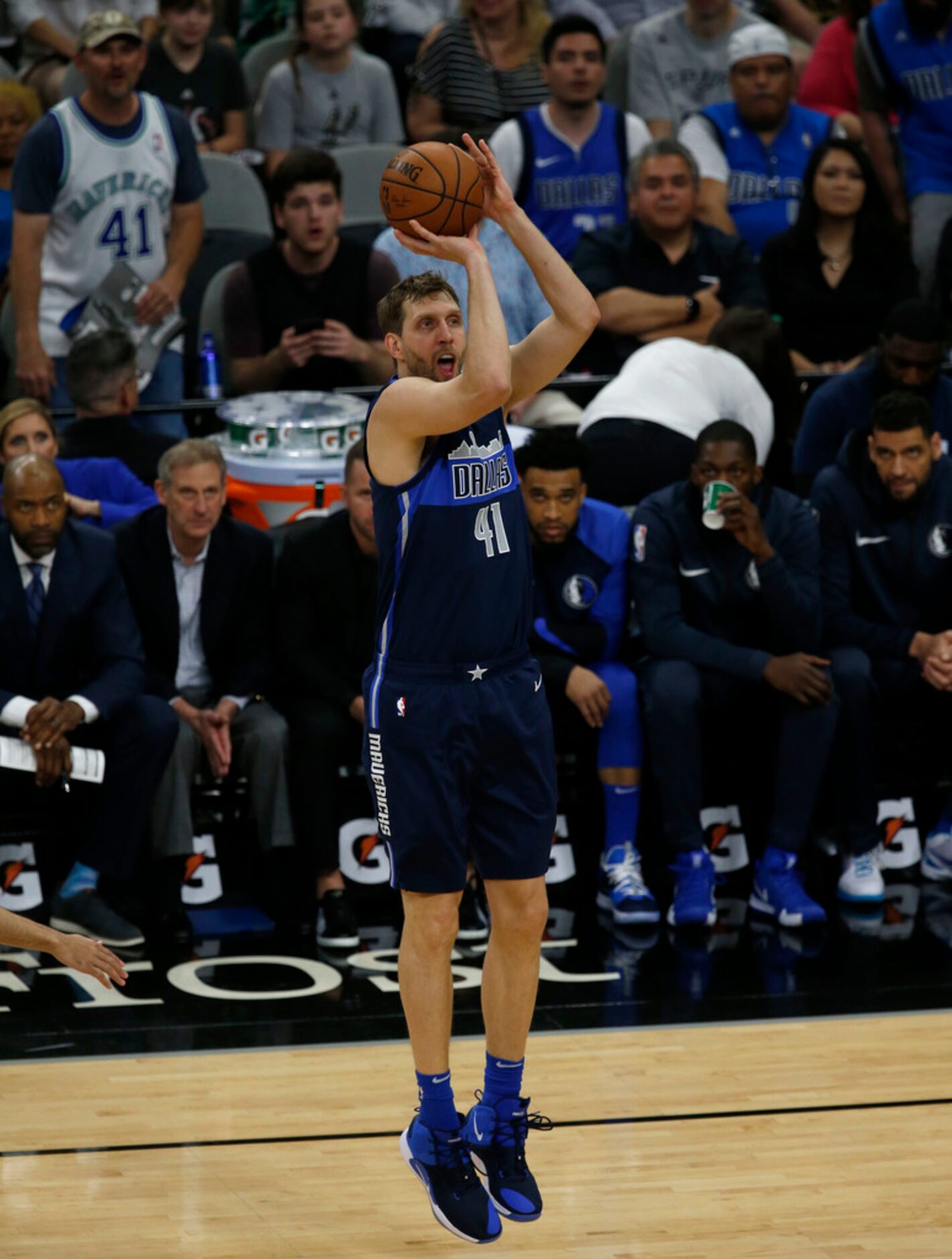 Dallas Mavericks forward Dirk Nowitzki (41) shoots during the first half of play against the...