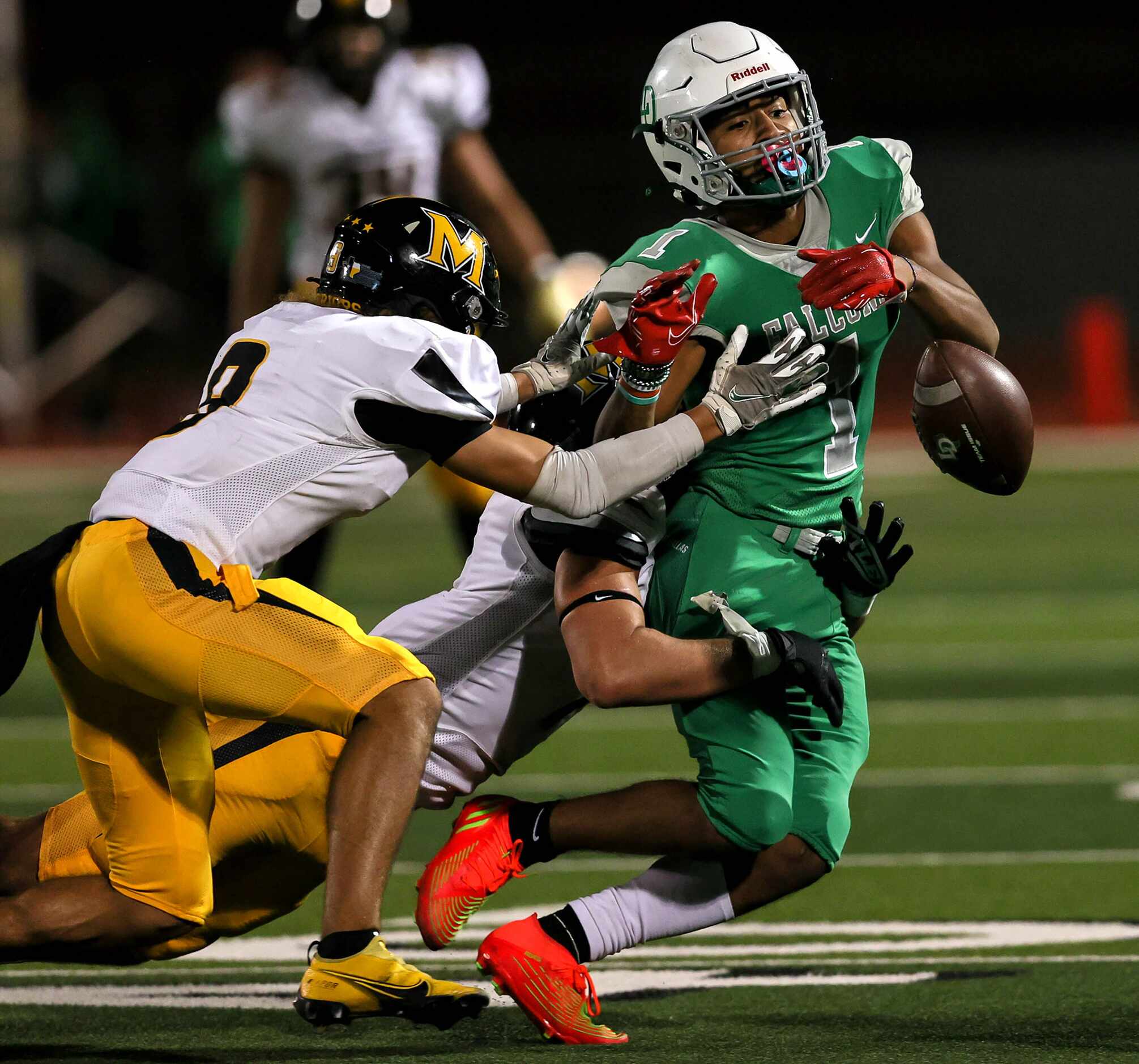Lake Dallas wide receiver Niki Gray (1) fumbles the ball against Frisco Memorial during the...