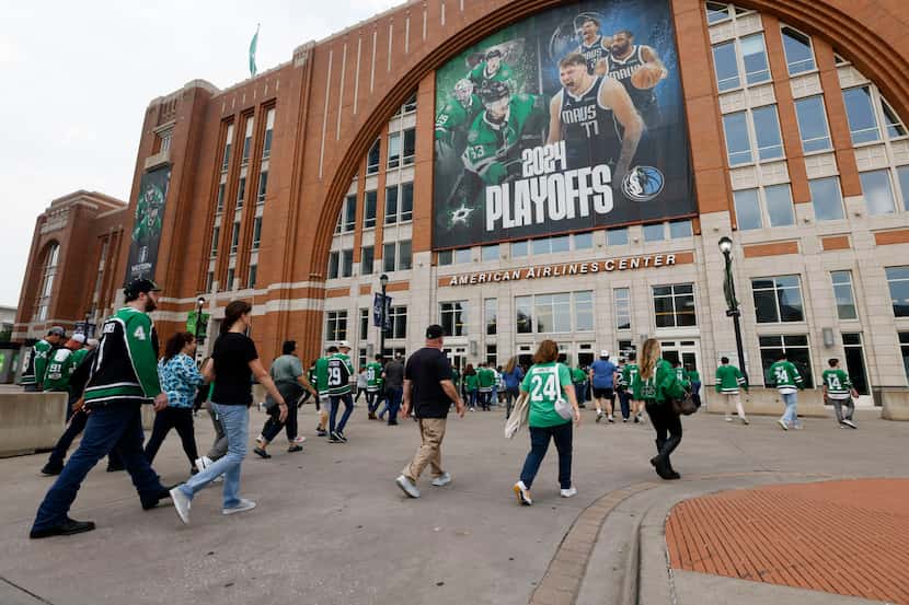 Dallas Stars fans make their way toward American Airlines Center before Game 2 of the NHL...