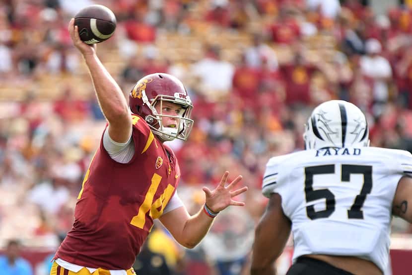 USC quarterback Sam Darnold throws a pass against Western Michigan at the Coliseum in Los...