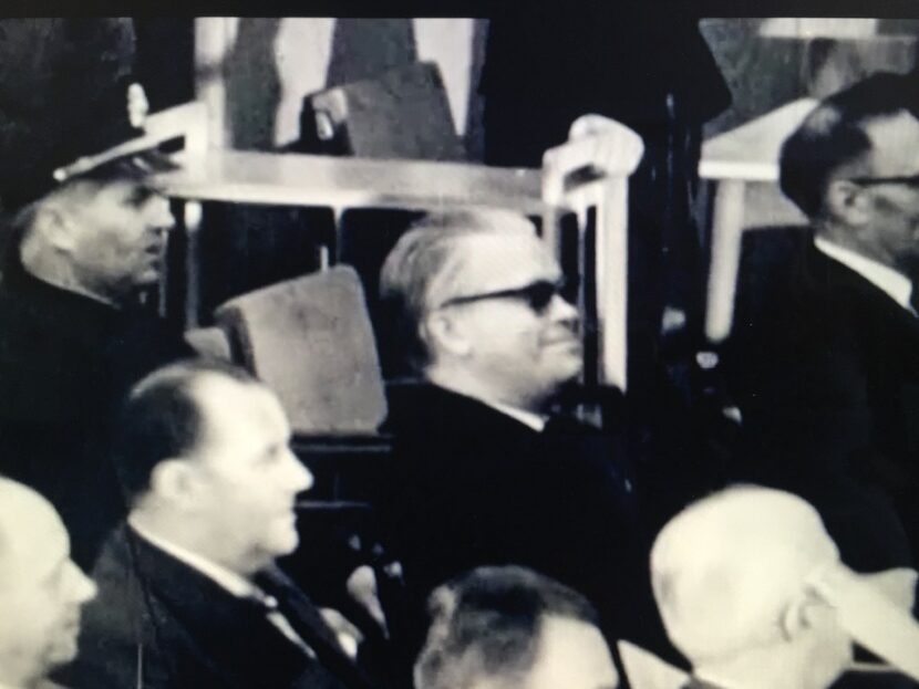 This photograph shows a seemingly cavalier Victor Capesius wearing sunglasses during his trial.