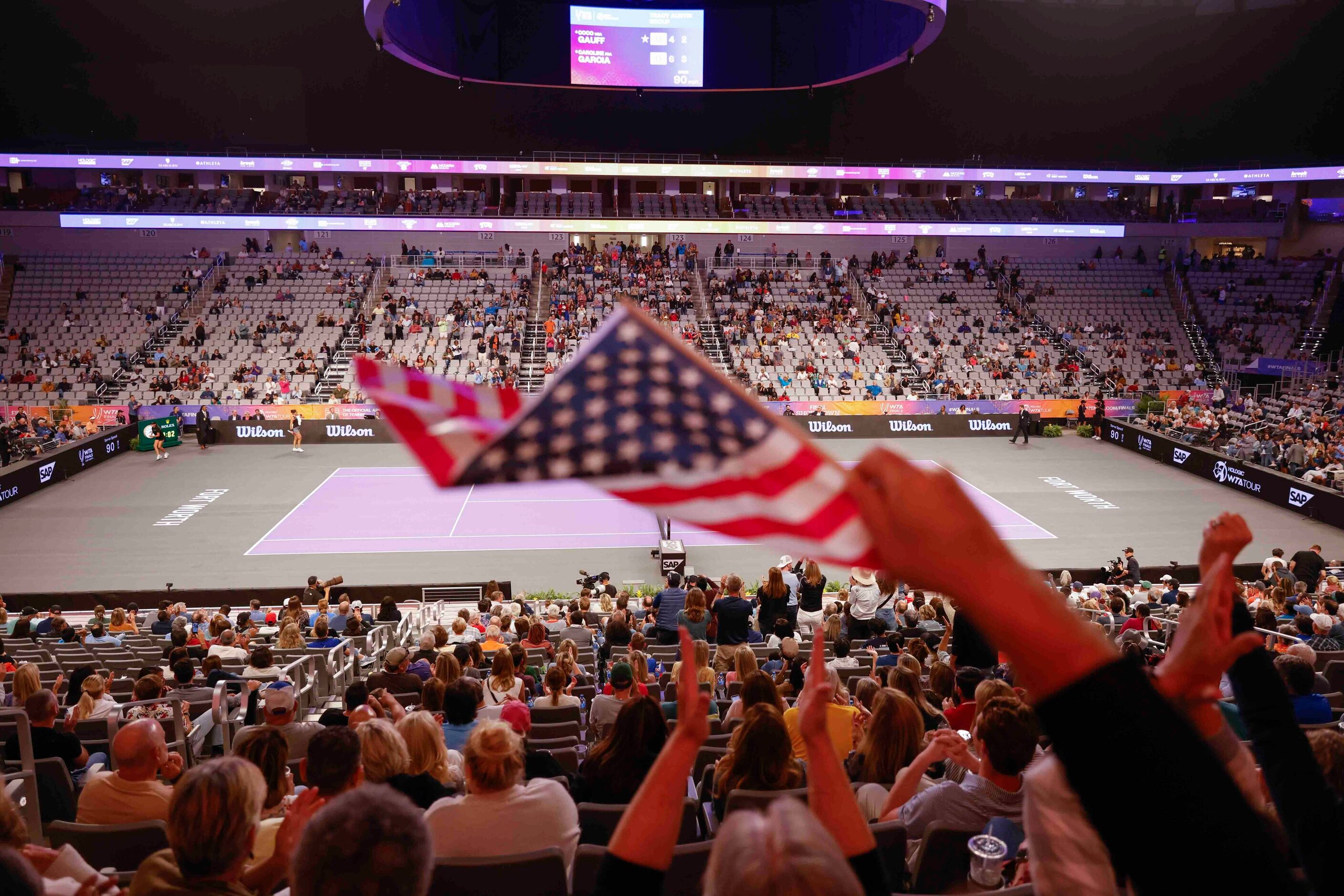 Crowds cheer during a game between Coco Gauff of the USA and Caroline Garcia of France on...