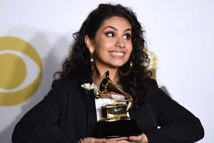 Canadian singer and songwriter Alessia Cara, winner of the Best New Artist award poses in...