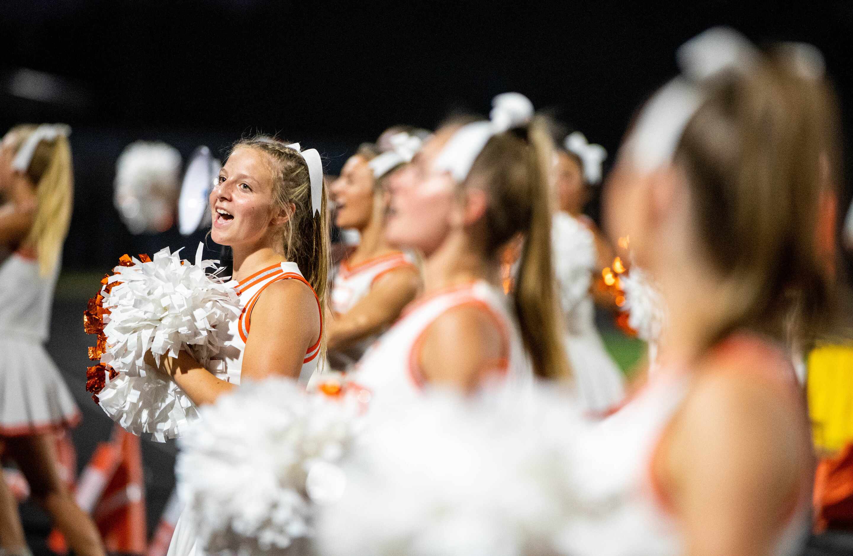 Celina cheerleaders perform in the first half during a high school football game against...