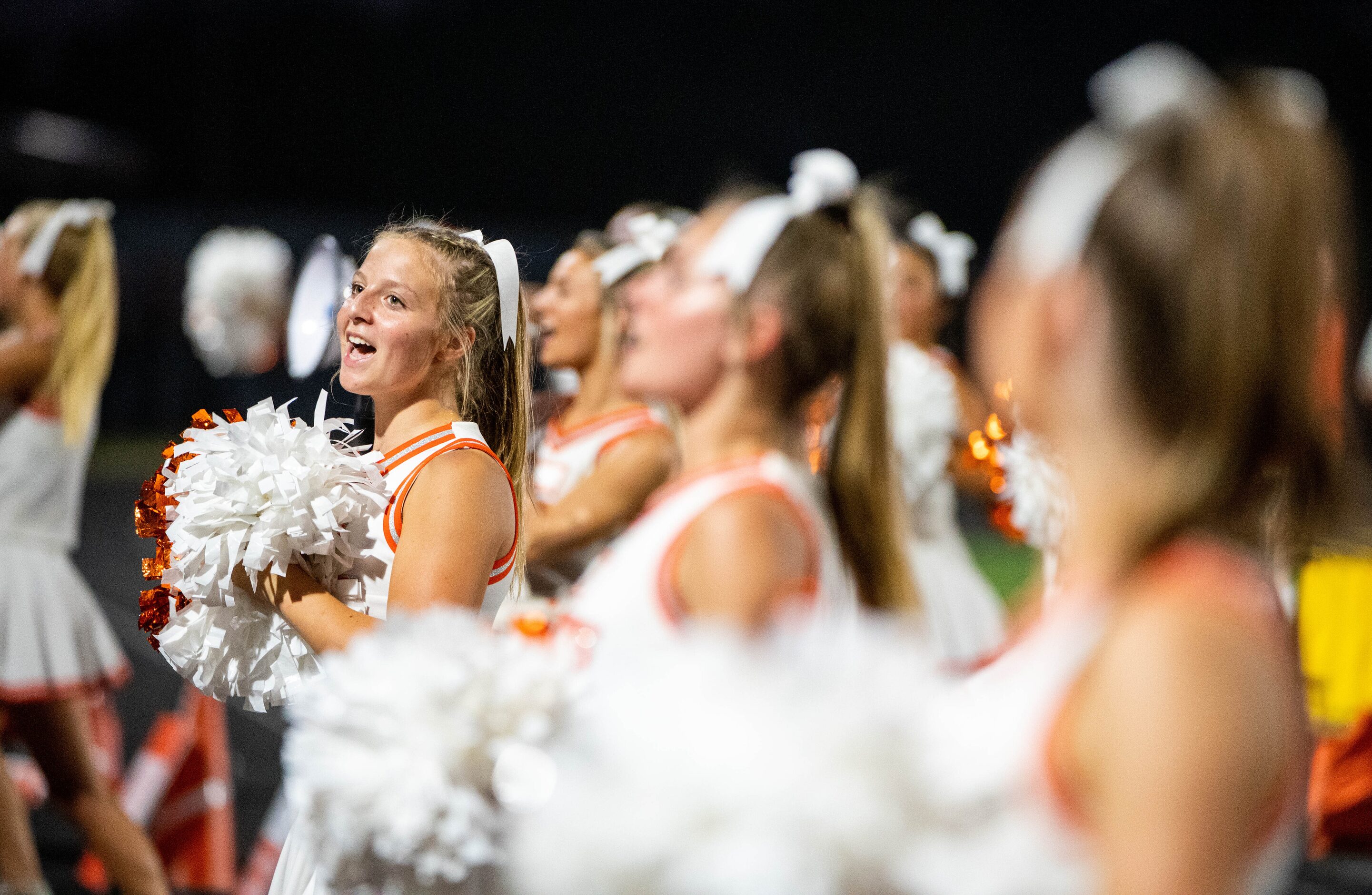 Celina cheerleaders perform in the first half during a high school football game against...