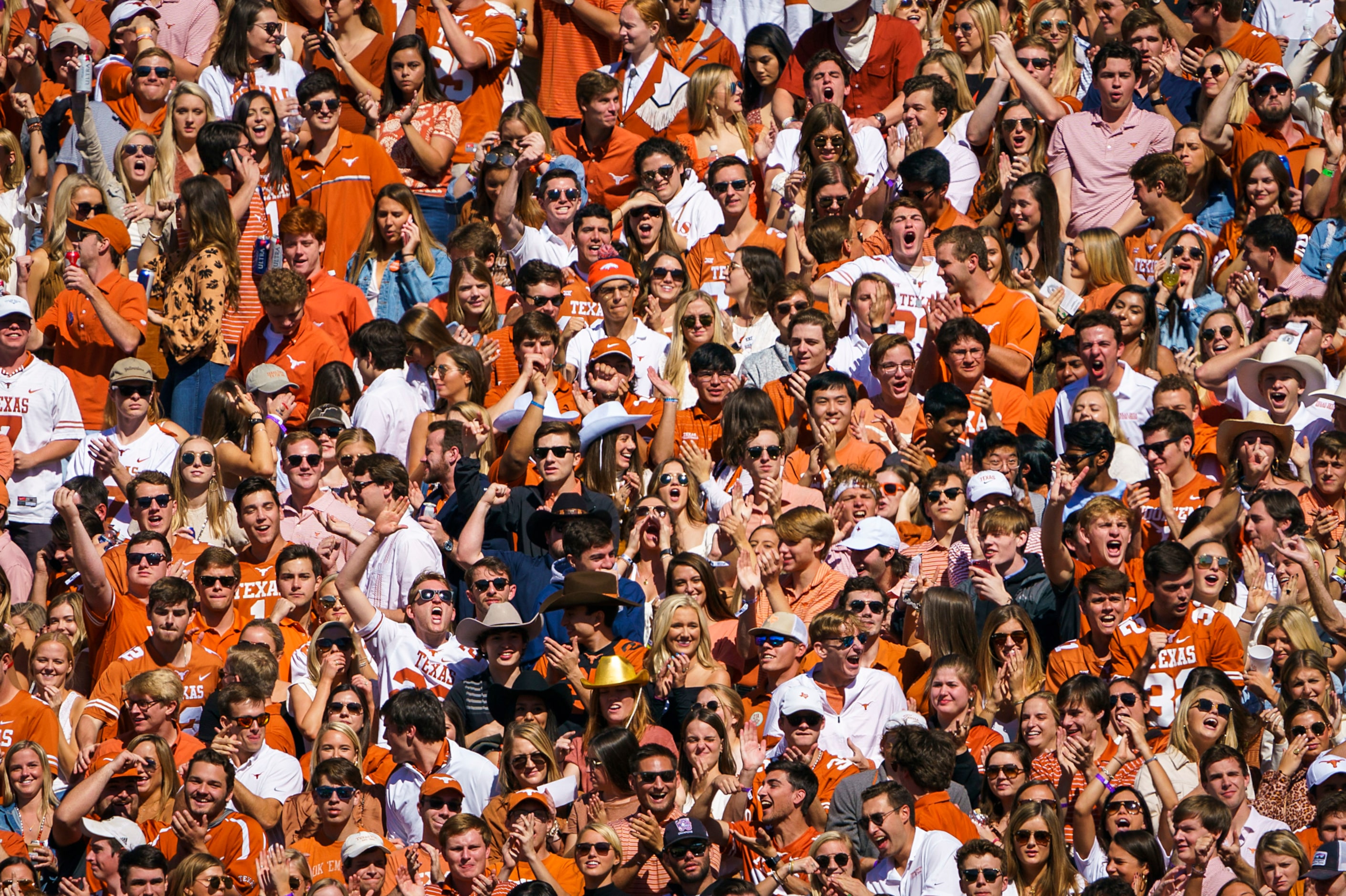 Texas fans cheer during the first half of an NCAA football game against Oklahoma at the...