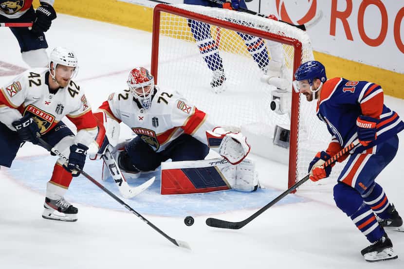 Florida Panthers' Gustav Forsling (42) and goalie Sergei Bobrovsky (72) follow the puck as...