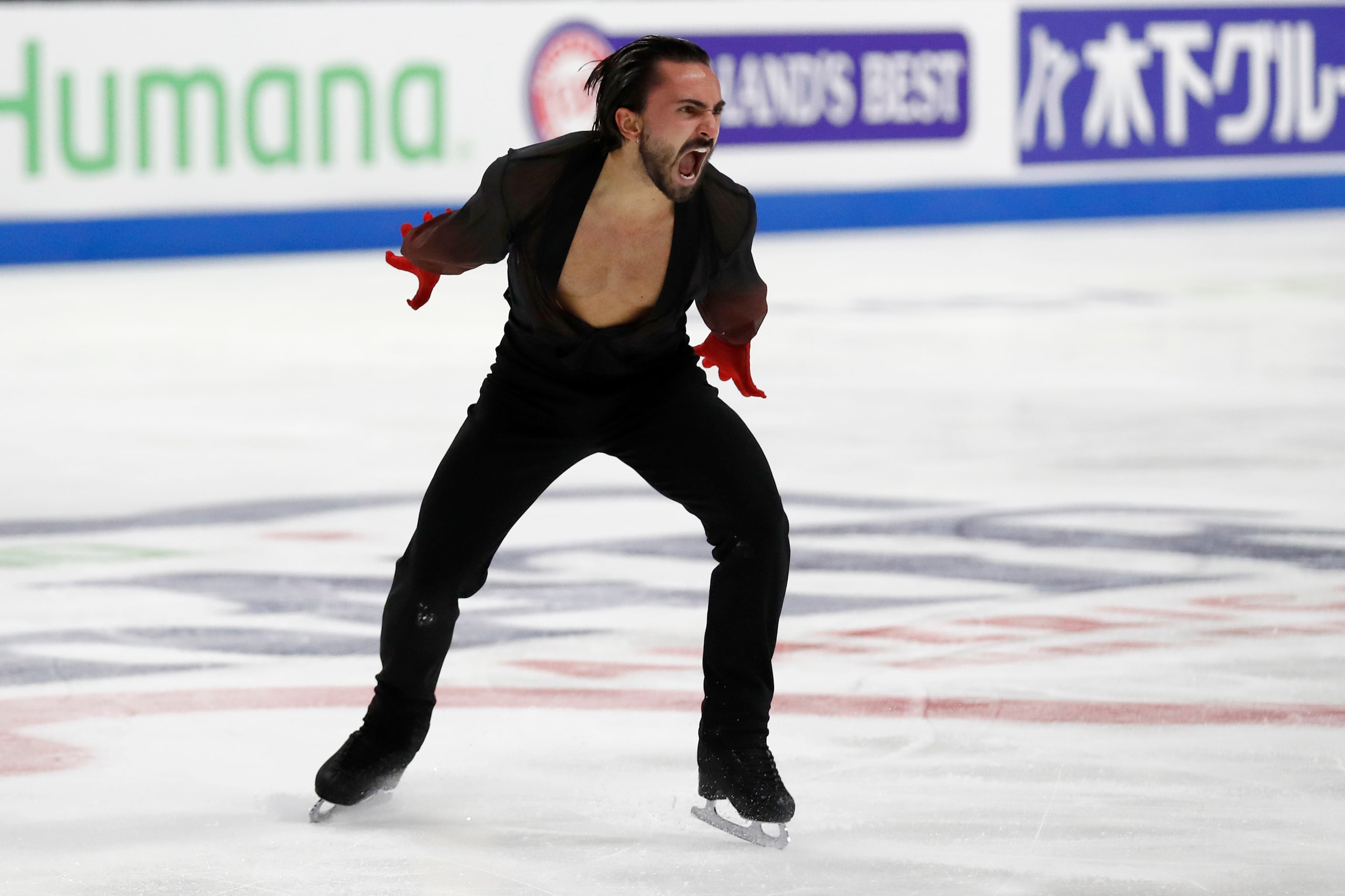 Kevin Aymoz, of France, competes in the men's free skate program during the Skate America...